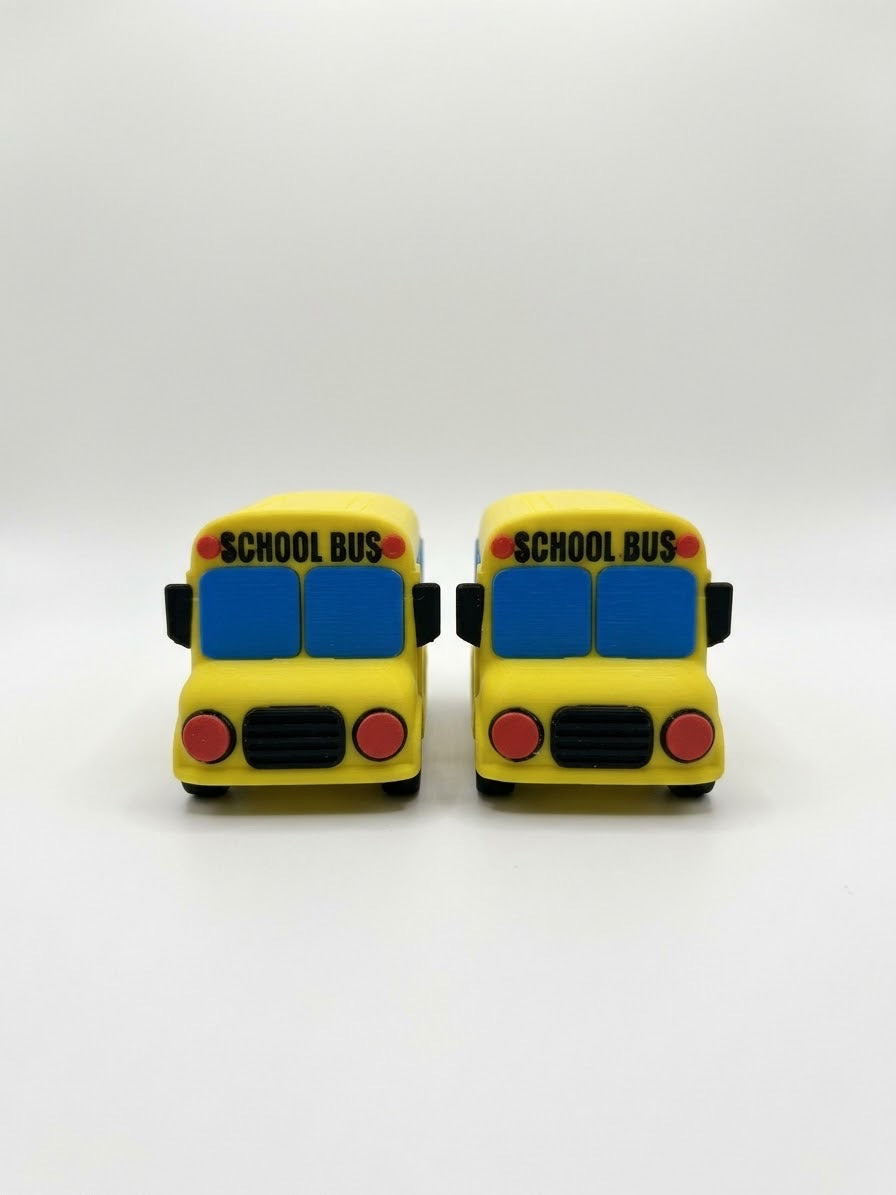 DJM 3D SHOP School Bus Fidget Toy clicker with colorful school bus design, small handheld sensory toy for stress relief and focus.