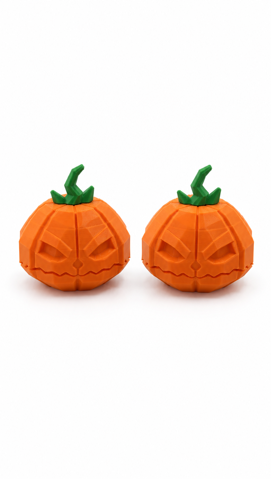 Two orange Jack o’Twister pumpkin figures with green stems and carved jack-o’-lantern faces 񟿿