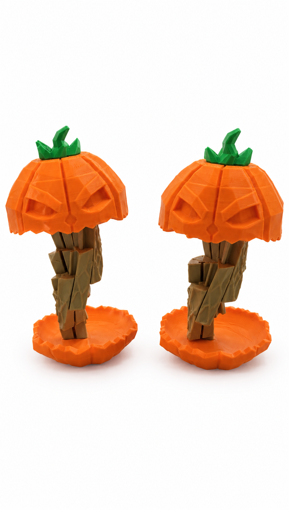 Two orange Jack o’Twister pumpkin figures with green stems on textured bases, front and angled views