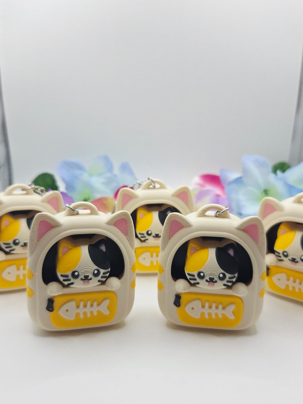 DJM 3D SHOP cat backpack clicker fidget toy with colorful design and compact size, perfect for stress relief and entertainment.
