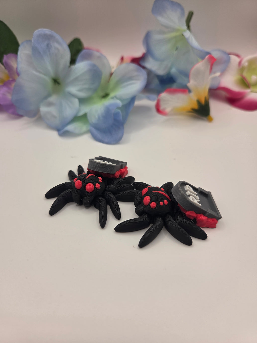 Close-up of a Spider RIP figure by DJM 3D SHOP, showcasing intricate details and realistic design on a white background.