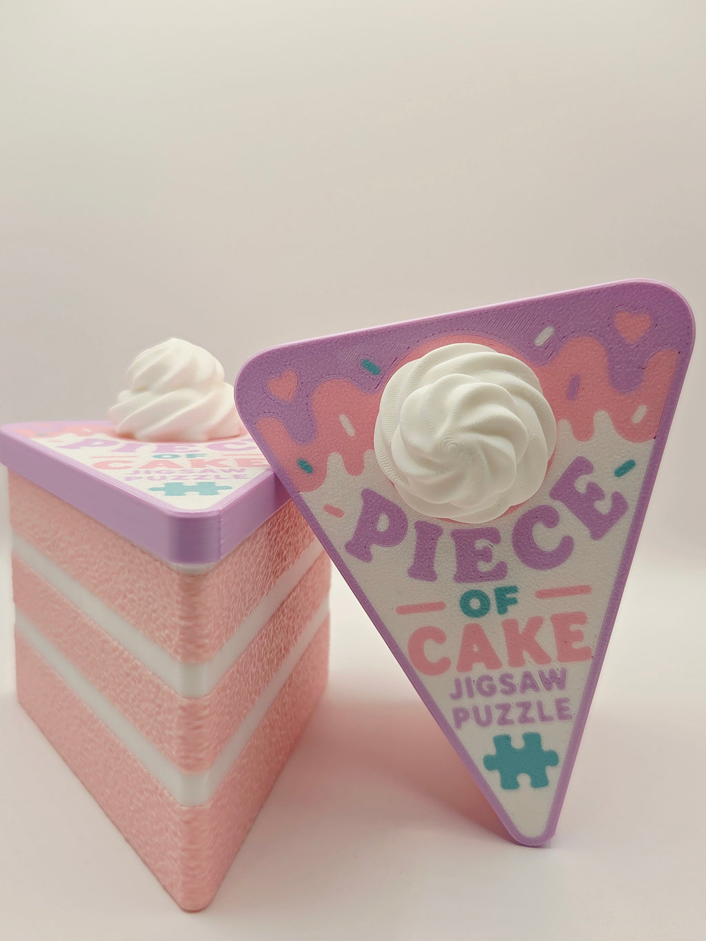 DJM 3D SHOP Cake Puzzles 3D fidget toy featuring colorful layered cake puzzle pieces for stress relief and entertainment.