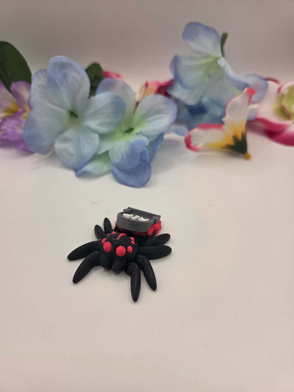 Spider RIP figurine by DJM 3D SHOP featuring a detailed spider design on a stand.